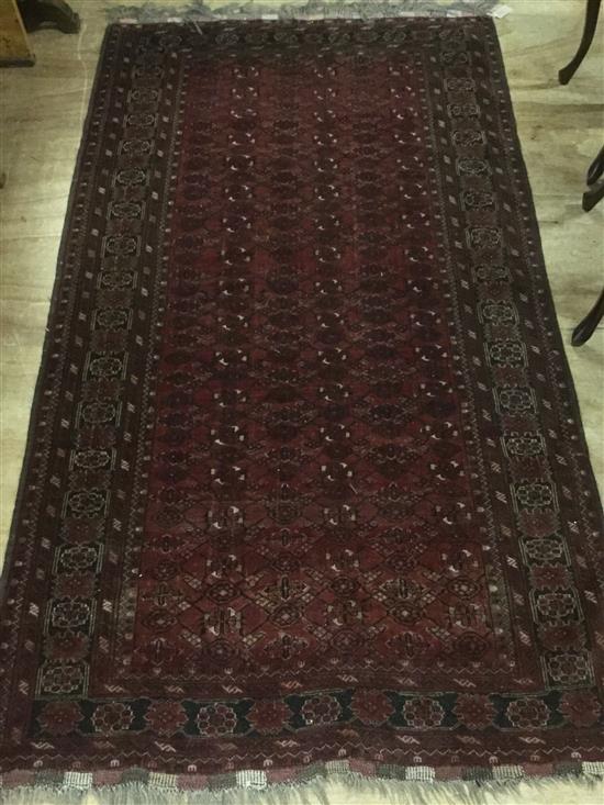 Red ground Bokhara rug